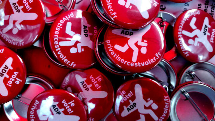 Buttons from a gathering against the plan to privatise Paris Airports are seen at the Place de la République in Paris on November 30, 2019.